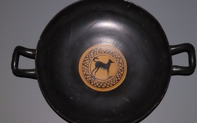 Ancient Greek Pottery Attic, c. 430 BC, Kylix plate with handles. Decorated with a pregnant wolf. 31 cm large.