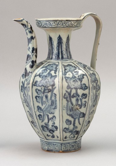 CHINESE BLUE AND WHITE PORCELAIN EWER Octagonal, with strap handle and bird and flower decoration. Height 10".