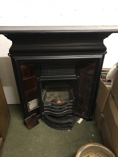 Cast iron fire surround including fire grate, maroon ceramic...
