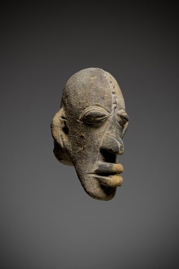 DJENNE, Mali. Terracotta digging head with nervous and...