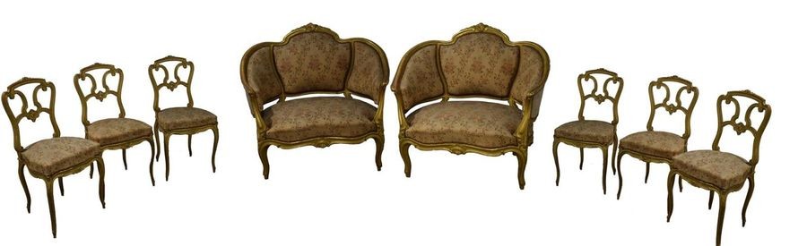 Deux bergères et six chaises en bois doré...