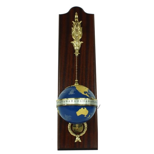 Devon clock globe timepiece, the movement contained within a...
