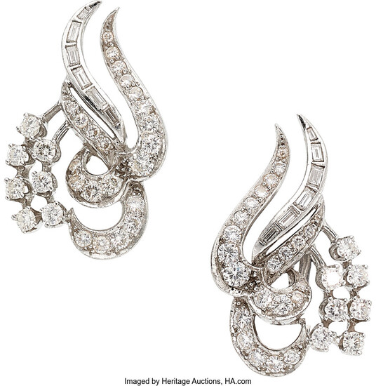 Diamond, Platinum, White Gold Earrings The earrings feature full-cut...