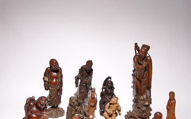 FOURTEEN CHINESE CARVED HARDWOOD AND BAMBOO FIGURES