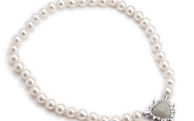 Georg Jensen & Wendel: An opal and diamond pearl necklace with cultured pearls and clasp set with an opal and numerous diamonds, mounted in 18k white gold.