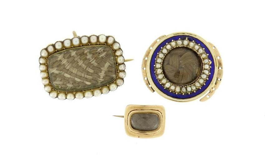 Georgian and later gilt metal mourning brooches and a