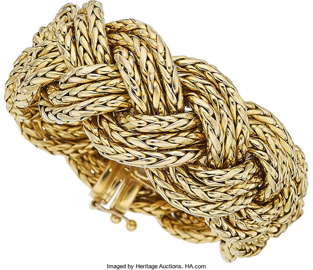 Gold Bracelet The 18k gold braided link bracelet weighs...