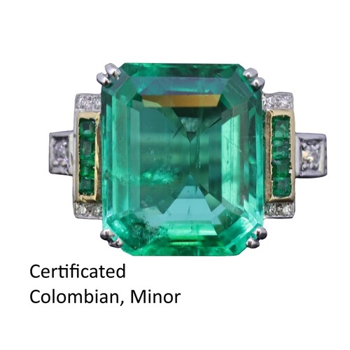 IMPORTANT 9CT COLOMBIAN EMERALD AND DIAMOND RING, set with a...