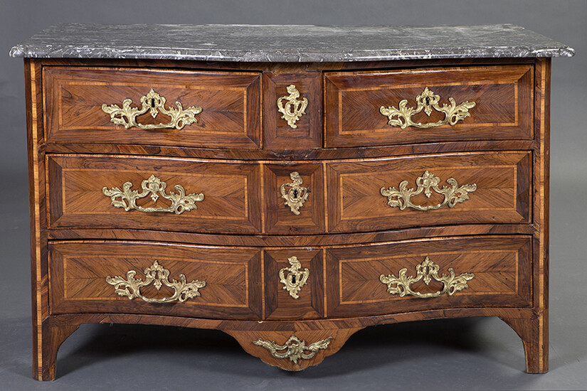 Important French chest of drawers stamped "Chevallier", France, 2nd half s. XVIII. In carved wood, with three drawer registers. Handles, applications and keyholes in gilded bronze. Lid in grey marble. Size: 81x60x18 cm. Output: 5.000
