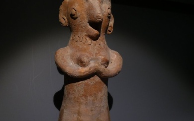 Indus Valley Terracotta Figure of a standing Fertility Goddess. 22 cm H. c. 2000 BC. Spanish Export License.