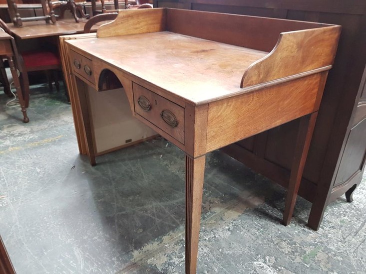 Late Georgian Mahogany Desk, with gallery back, two drawers flanking a knee-hole & tapering legs