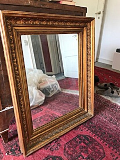 NOT SOLD. A mirror in frame of gilded carved wood, 19th century H. 80. W....