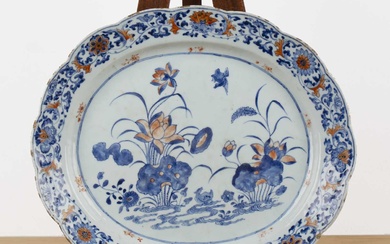 Oval porcelain serving dish Chinese, 18th Century painted with lotus...