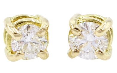 Pair of 18ct gold single stone round brilliant cut diamond stud earrings