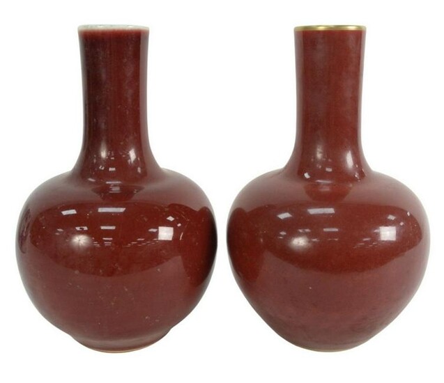 Pair of Chinese Bottle Form Oxblood Langyao Vases, one
