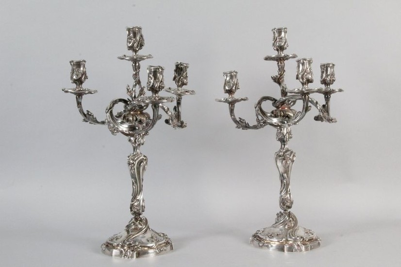 Pair of silver plated metal candelabra in the...