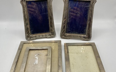 Pair of sterling silver easel backed picture frames together...