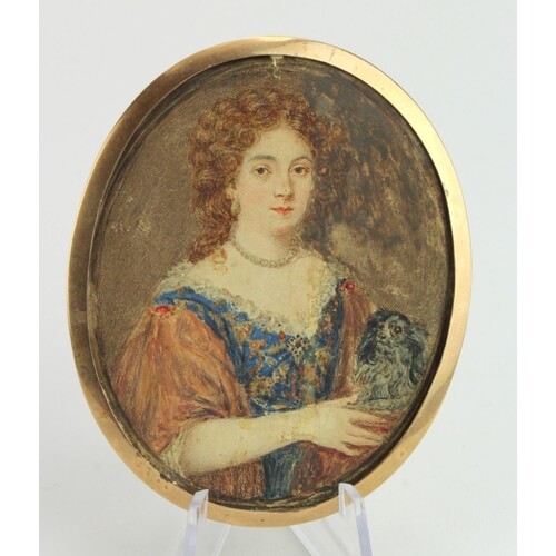 Portrait miniature of a 17th Century Lady. In a gilt oval f...