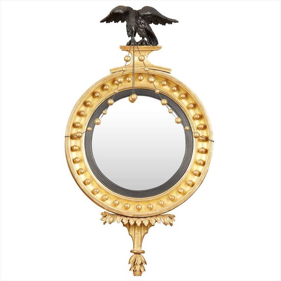 REGENCY CARVED GILTWOOD AND EBONISED CONVEX MIRROR EARLY 19TH CENTURY