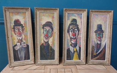 Set of four early 20th C. Clown oil on canvases mounted in w...