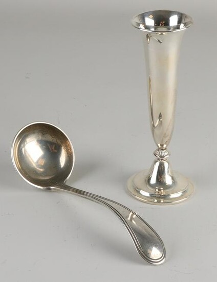 Silver spoon and vase, 833/000. A sauce spoon