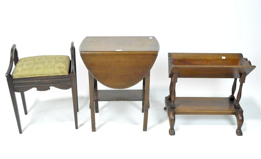 Three items of 20th century furniture: a mahogany drop leaf table, piano stool and magazine rack