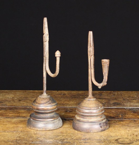 Two Similar Late 18th/Early 19th Century Style Wrought Iron Rushnips with turned treen bases. One wi