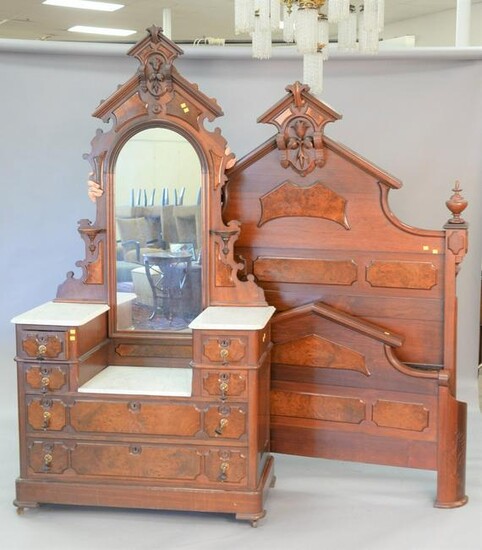 Two-piece walnut Victorian bedroom set with dropwell