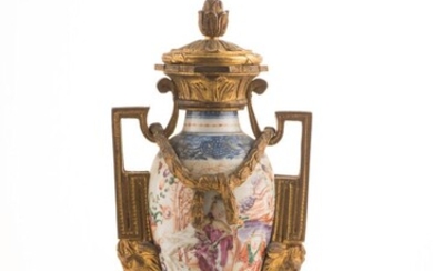 Vase en porcelaine émaillée polychrome, à décor de personnages dans des paysages, monture néoclassique en...
