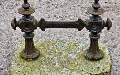 Victorian cast iron boot scraper mounted on a granite base, ...