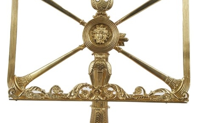 100 Lutrin de table en bronze à décor ajouré de motif radié, lyre et trompette,...
