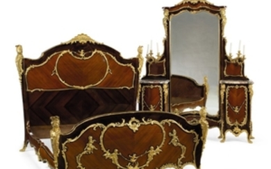 A FINE AND LARGE FRENCH ORMOLU-MOUNTED KINGWOOD AND BOIS SATINÉ THREE-PIECE BEDROOM SUITE, IN THE MANNER OF CHARLES CRESSENT, BY EMMANUEL ZWIENER, PARIS, LATE 19TH CENTURY