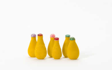 A collection of Chinese yellow glass snuff bottles