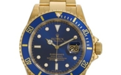ROLEX | A YELLOW GOLD AUTOMATIC WRISTWATCH WITH DATE AND BRACELET REF 16618 NO Z693133 SUBMARINER CIRCA 2006