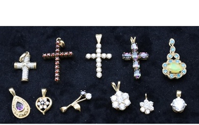 11 various 9ct gold small pendants, all set with various col...