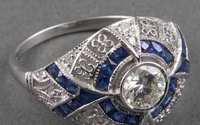 14kt witgouden ring gezet met blauwe saffier en diamant,...