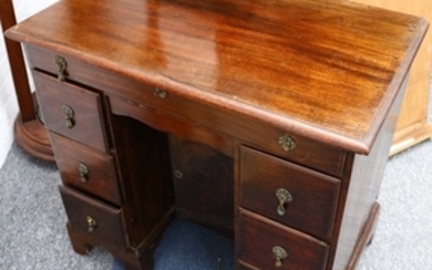 A George II style mahogany kneehole desk, early...