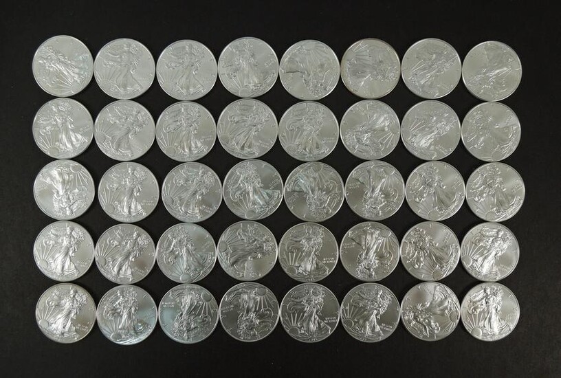 (40) American Silver Eagle Dollars.