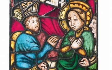 A late Gothic stained glass window with saints