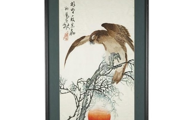 A Chinese embroidery depicting a bird of prey on a