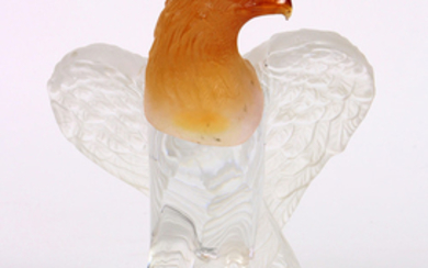 Daum France Pate de Verre crystal eagle, having an amber colored head continuing to the frosted to clear body marked Daum France, an...