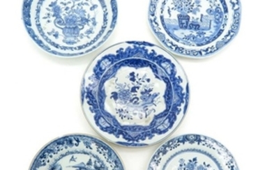 A Diverse Collection of Five Blue and White Plates