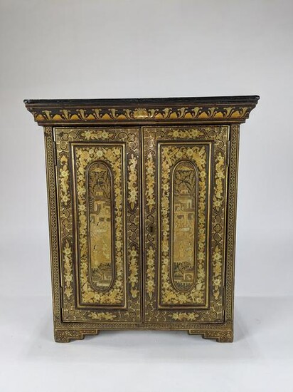 A Chinese lacquered wood dresser cabinet