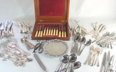 Two part suites of silver plated cutlery, one by Elkington; a pair of plated candle snuffers; a small EPNS salver; a mahogany...