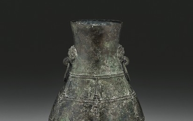 A BRONZE RITUAL WINE VESSEL, HU, LATE SPRING AND AUTUMN PERIOD, LATE 6TH-EARLY 5TH CENTURY BC