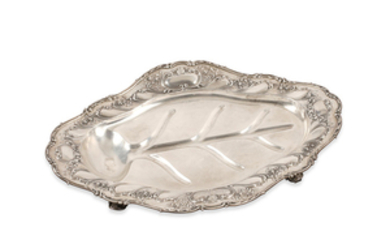 An American sterling silver oval footed platter with tree and well form