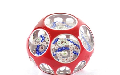 A Baccarat Red and White Double Overlay Millefiori Paperweight, circa...