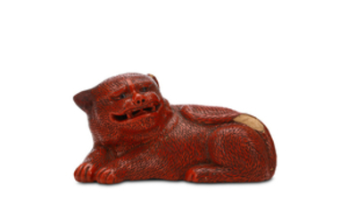 A CHINESE CINNABAR LACQUER CAT. Early 20th Century....