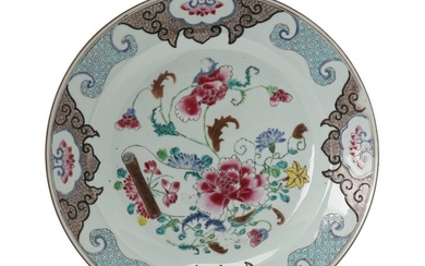 A Chinese famille rose porcelain dish, decorated in colours with flowers. Qianlong 1736–1795. Diam. 39 cm.