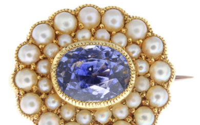 An early 20th century 15ct gold Sri Lankan sapphire and split pearl brooch.